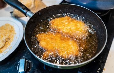 Close up view of katsu being fried