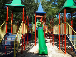 Children's playground with stairs and slides.