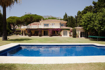 Luxury lap pool and villa