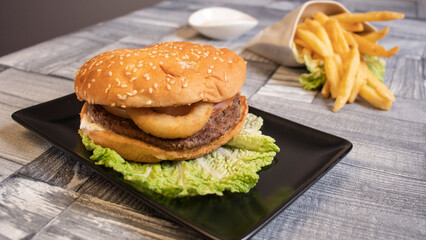 hamburger and sauce and fried potatoes