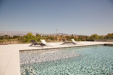 Swimming pool overlooking tree and mountains