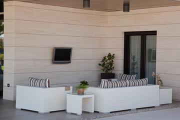 Sofa and television on luxury patio