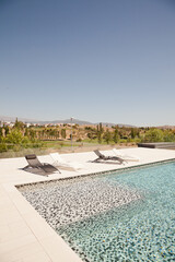 Swimming pool overlooking tree and mountains