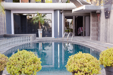 Luxury swimming pool and house
