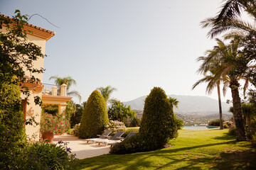 Garden surrounding courtyard doorway of luxury villa