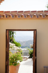 Doorway from patio into Spanish villa
