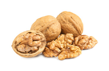 Pile of ripe walnuts on white background