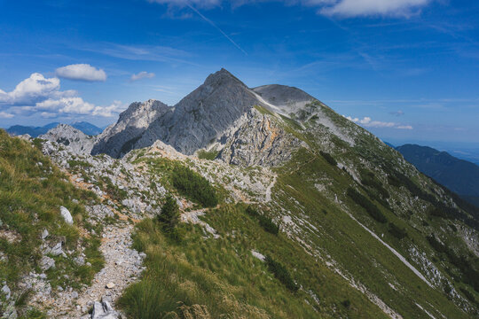 Beautiful mountain path. On the way to Mount Stol, Karawanken Mountains, Slovenia, Europe. Mountain lovers. Beauty of nature concept background.