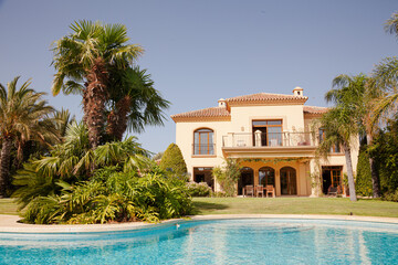 Swimming pool and Spanish villa