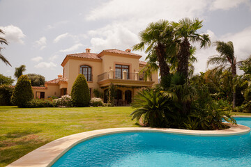 Luxury swimming pool and Spanish villa