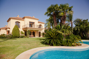 Luxury swimming pool and Spanish villa