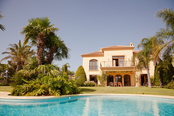 Swimming pool and Spanish villa - obrazy, fototapety, plakaty
