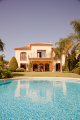 Swimming pool and Spanish villa