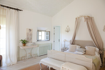 Bed with canopy in luxury bedroom