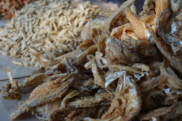 Fried fish with a natural background. Indonesian fried fish covered with flour, usually use small fish. This food also called wader goreng