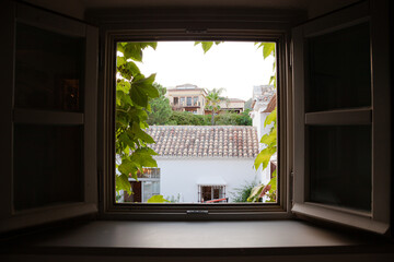 View of courtyard through window