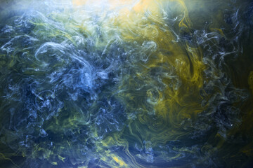 Fototapeta na wymiar Earth colors abstract background, colorful smoke paint underwater, swirling ink in water, exoplanet blue sea ocean