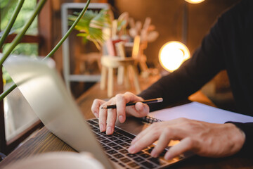young business people working in cafes co-working space by using computer laptop technology, professional worker person with modern lifestyle via online cyberspace communication online office
