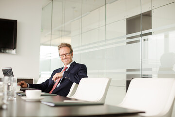 Fototapeta premium Businessman working on computer at desk