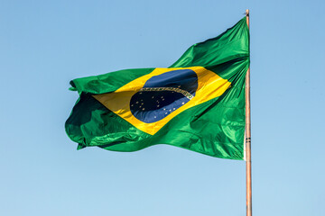 Flag of Brazil outdoors in Rio de Janeiro, Brazil. - obrazy, fototapety, plakaty