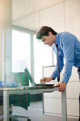 Businessman working on computer at desk