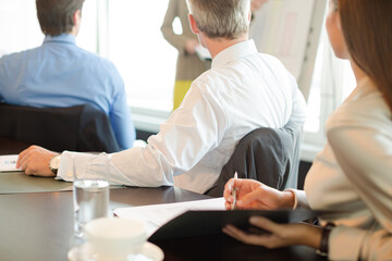 Obraz premium Business people sitting in meeting