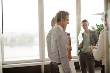 Fototapeta premium Business people talking in office hallway