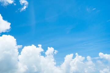 Naklejka na ściany i meble Beautiful white cloud with blue sky background.Bright blue sky background with tiny clouds.