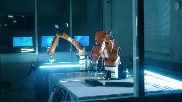 IT laboratory with several robotic mechanisms at work