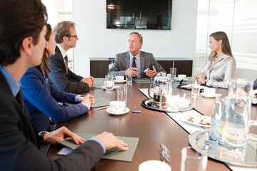 Business people talking in meeting
