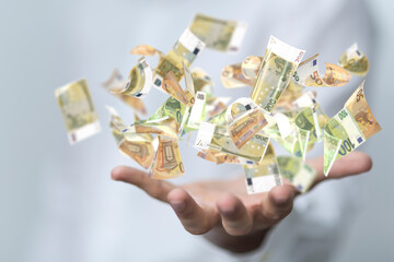 bill euro banknote in hand rain