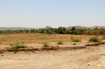 Fototapeta na wymiar View of dry river in India with background of nature and mountain