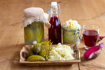 Homemade preserves: beetroot leaven, sauerkraut and pickled cucumbers
