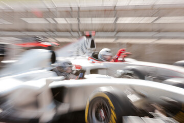 Race cars driving on track