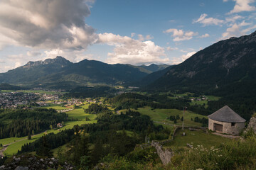 Fototapeta premium Alpine green landscape in summer on a cloudy day, Reutte, Austria