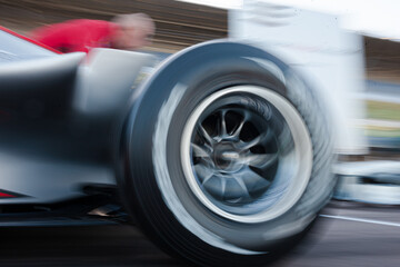 Blurred view of race car on track