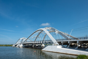 Obraz premium The Enneus Heerma Bridge in Amsterdam IJburg, Noord-Holland province, The Netherlands