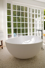 Bathtub in modern bathroom