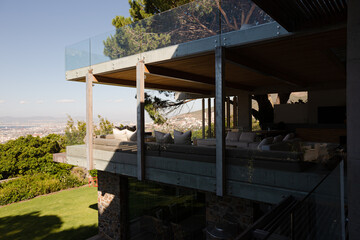 Facade of modern house and well-decorated balcony