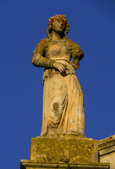 Obraz premium Statue on the Church of Grieved Lady Mary, Locorotondo, Italy