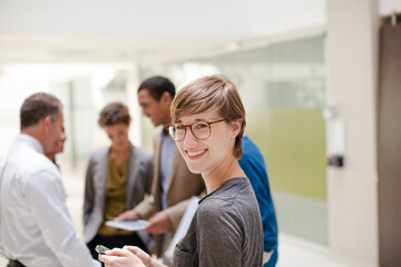 Businesswoman smiling in meeting