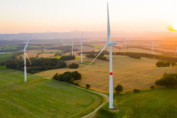 Aerial view of wind turbines and windmills in the field. Alternative green electrical energy...