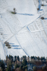 Fields in the snow, from above, aerial view