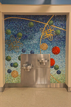Jacksonville, Florida - January 31, 2016: A section of &ldquo;Celestial Playground,&rdquo; a mosaic mural by New York artist Amy Cheng, surrounds the water fountain at JAX Airport.