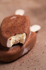 Popsicle ice cream. Chocolate-covered ice cream. Close-up of the dessert. Macro photography of food.