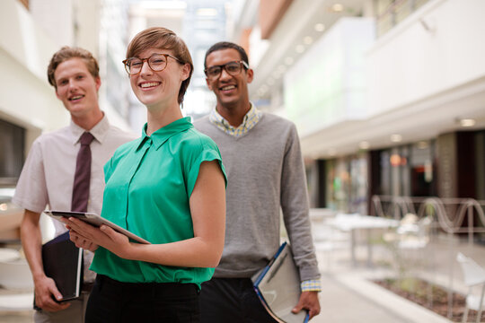 Business people smiling in meeting