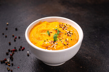 pumpkin cream soup puree fresh portion ready to eat meal snack on the table copy space food background rustic. top view keto or paleo diet veggie vegan or vegetarian food