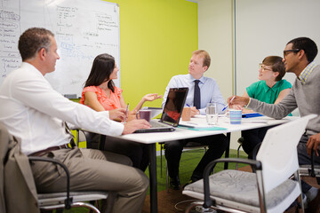 Business people talking in meeting
