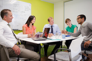 Business people talking in meeting
