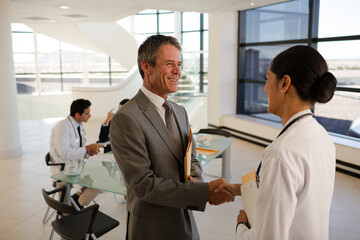 Portrait of smiling doctors and businessman